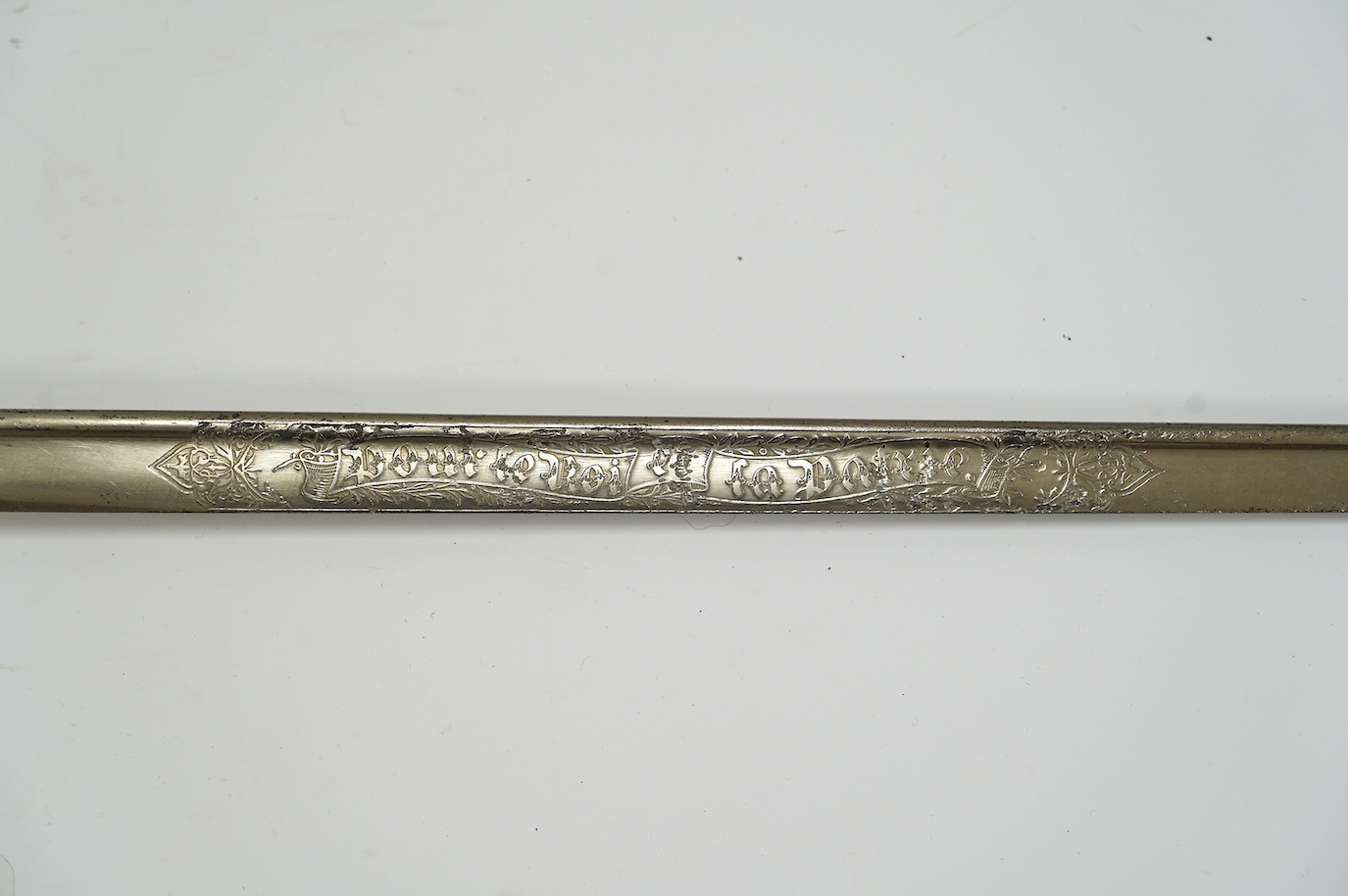 A Belgian WWI infantry officer’s pipeback sword, blade etched with crowned A ‘Albert I’ and ‘Pour le Roi et la Patrie’ with regulation brass hilt, blade 74.5cm. Condition - good